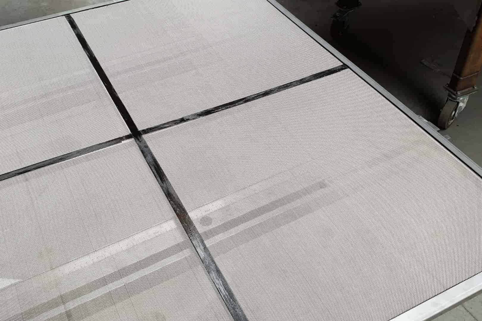 Trilzeef na hersteldienst bij Omnimesh.