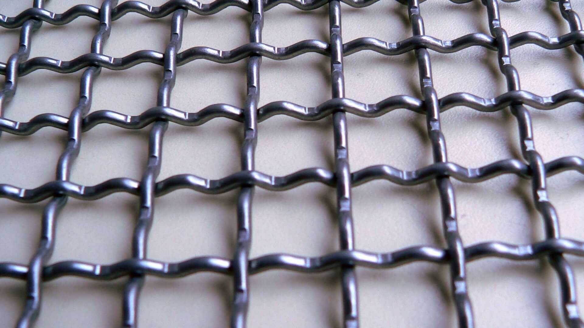 Gevlochten golfgaas voor industrieel zeefdek