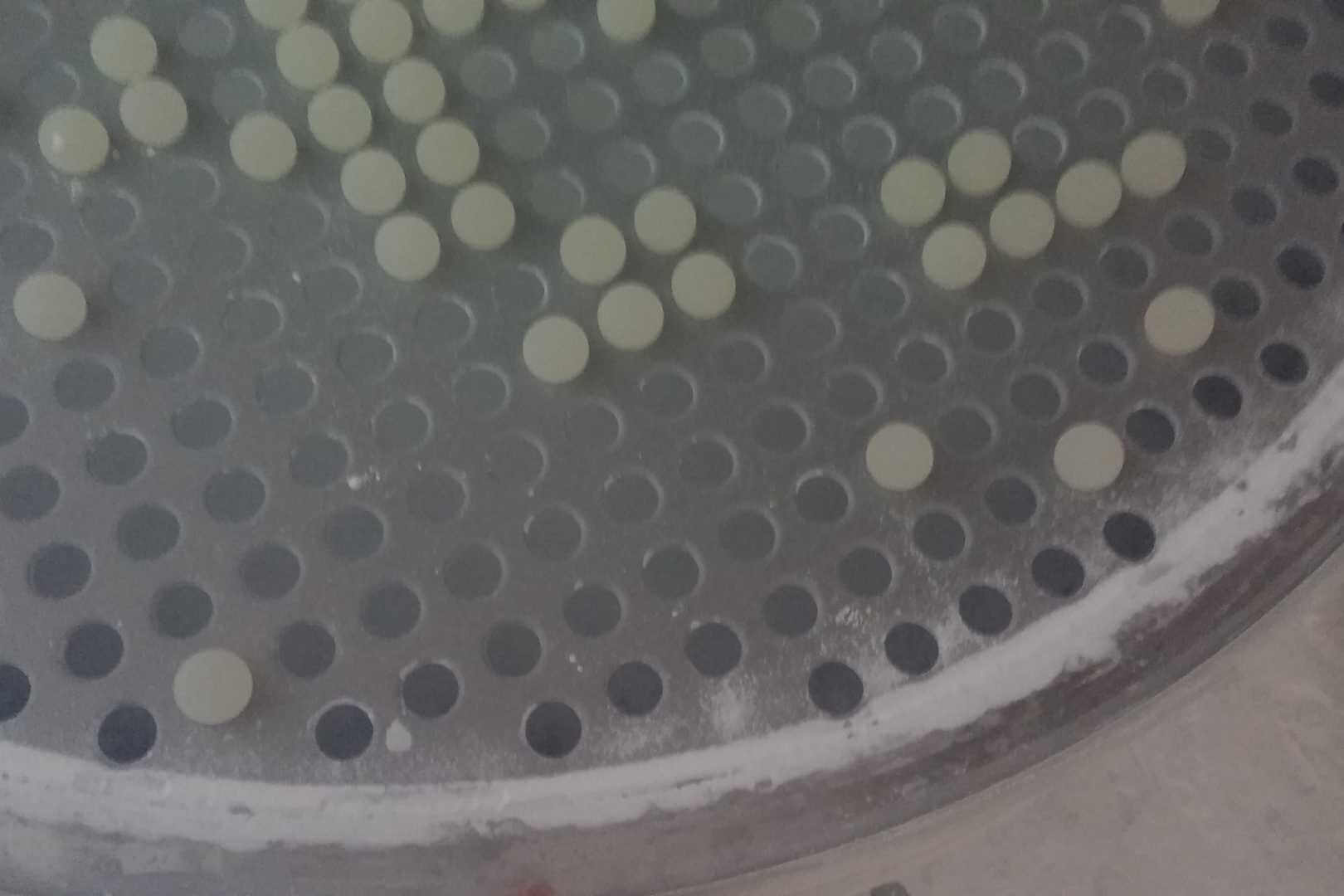Zeefballen in een zeefraam